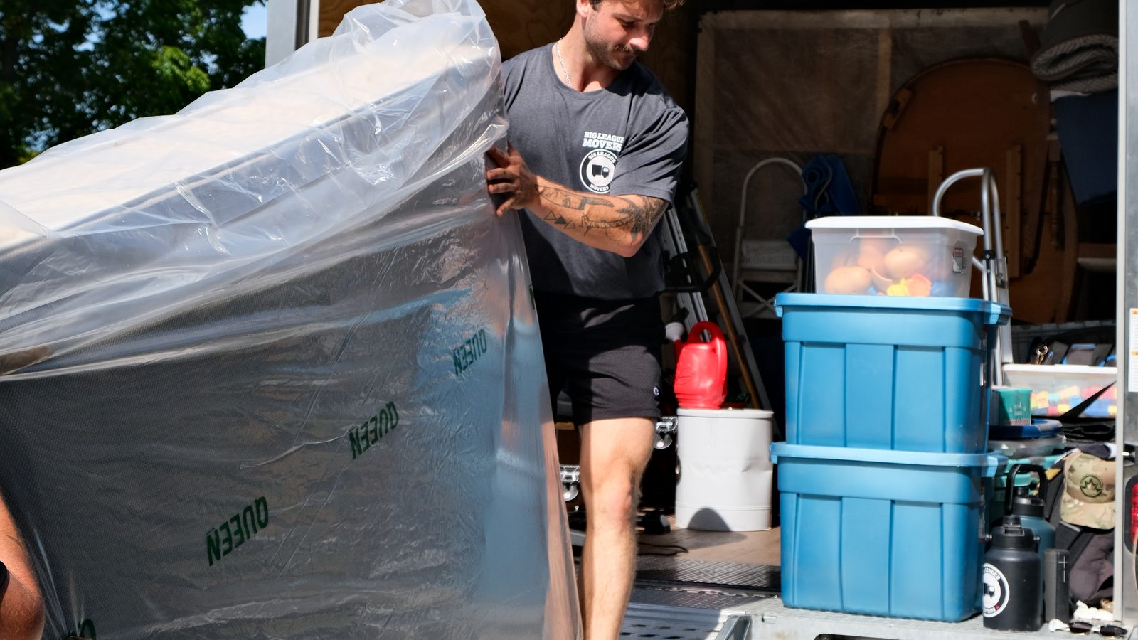 Big League Movers crew loading a moving truck