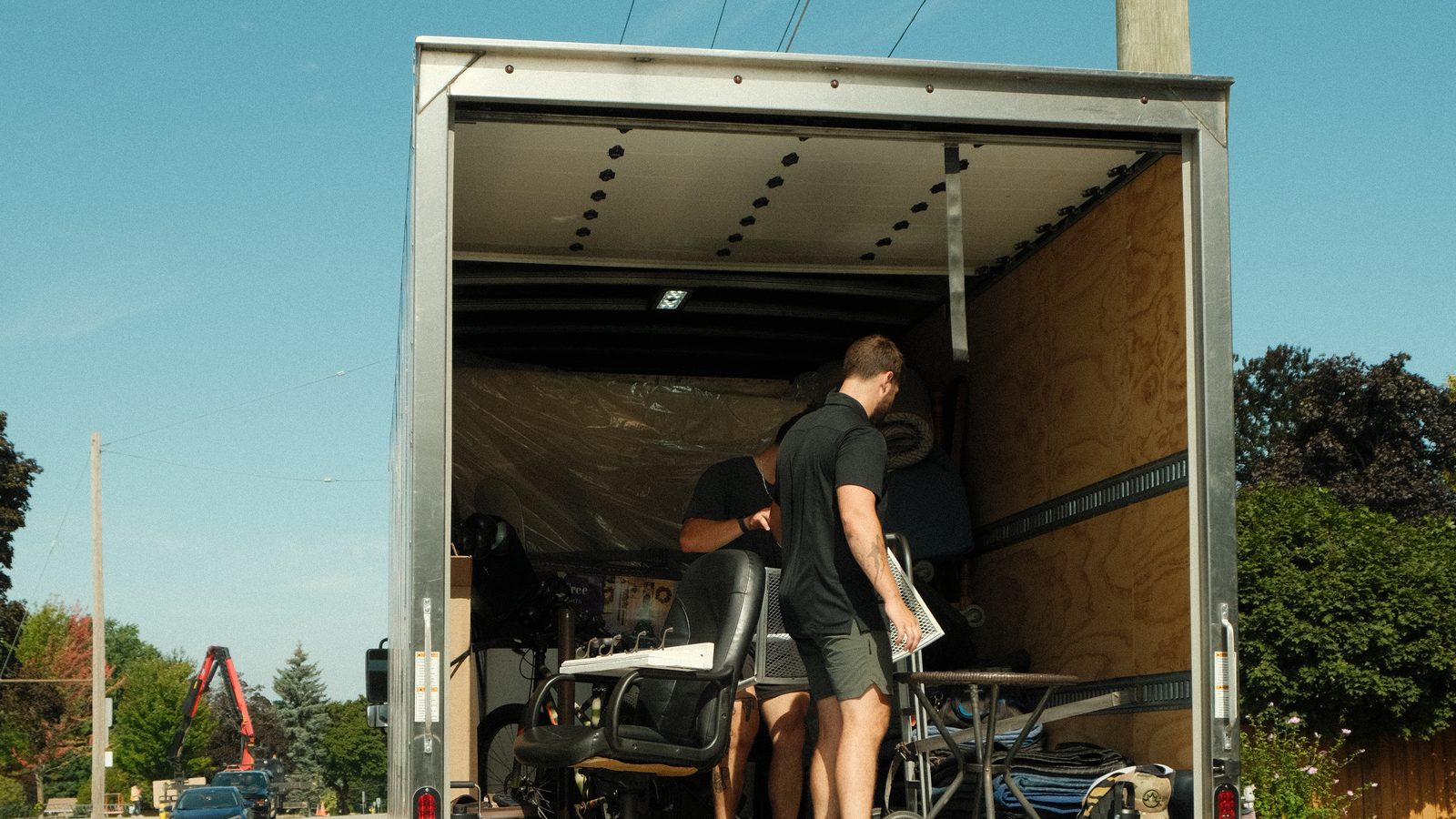Big League Movers crew loading the moving truck